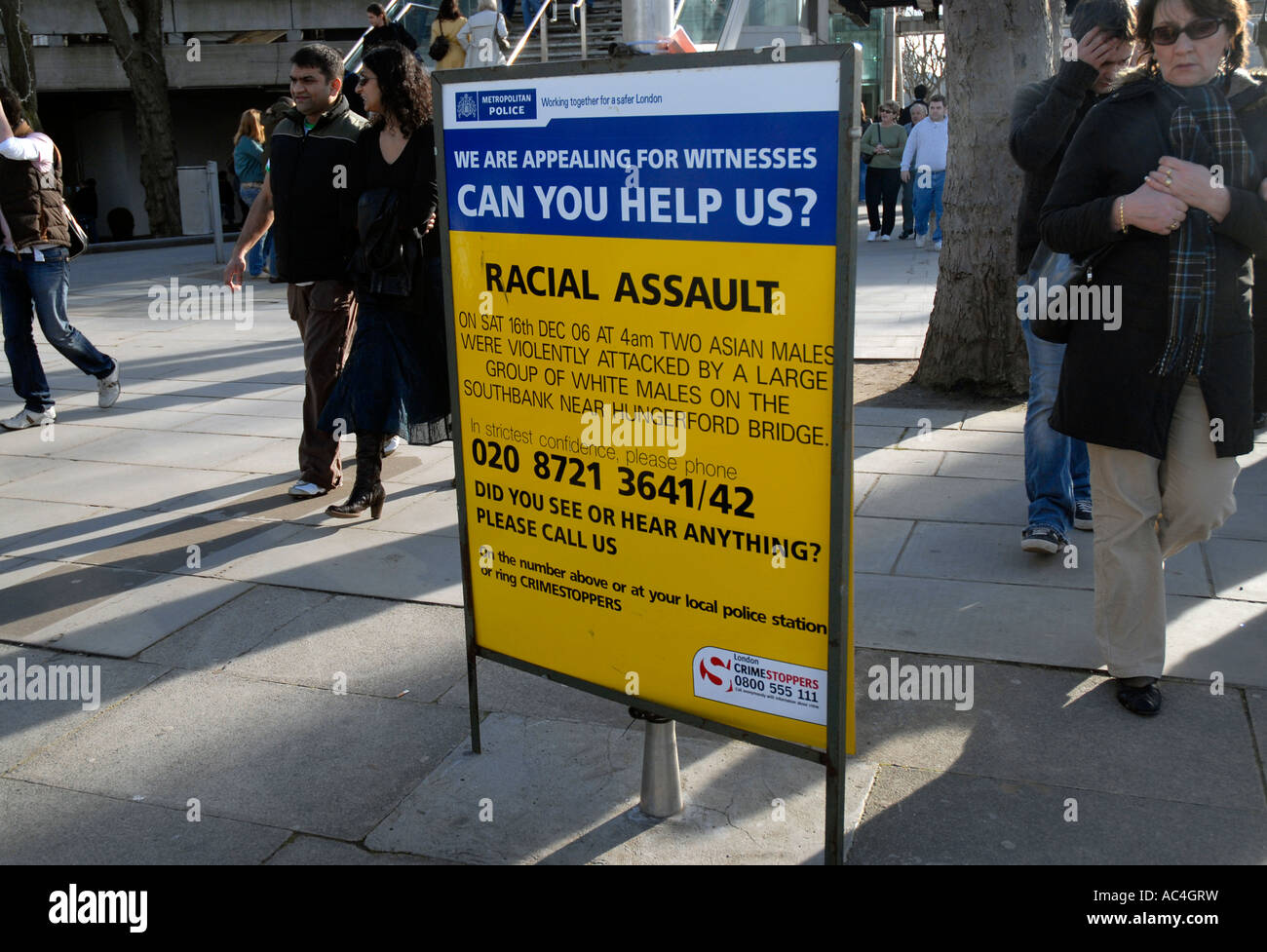 Racial Assault board asking for witnesses in London. Stock Photo