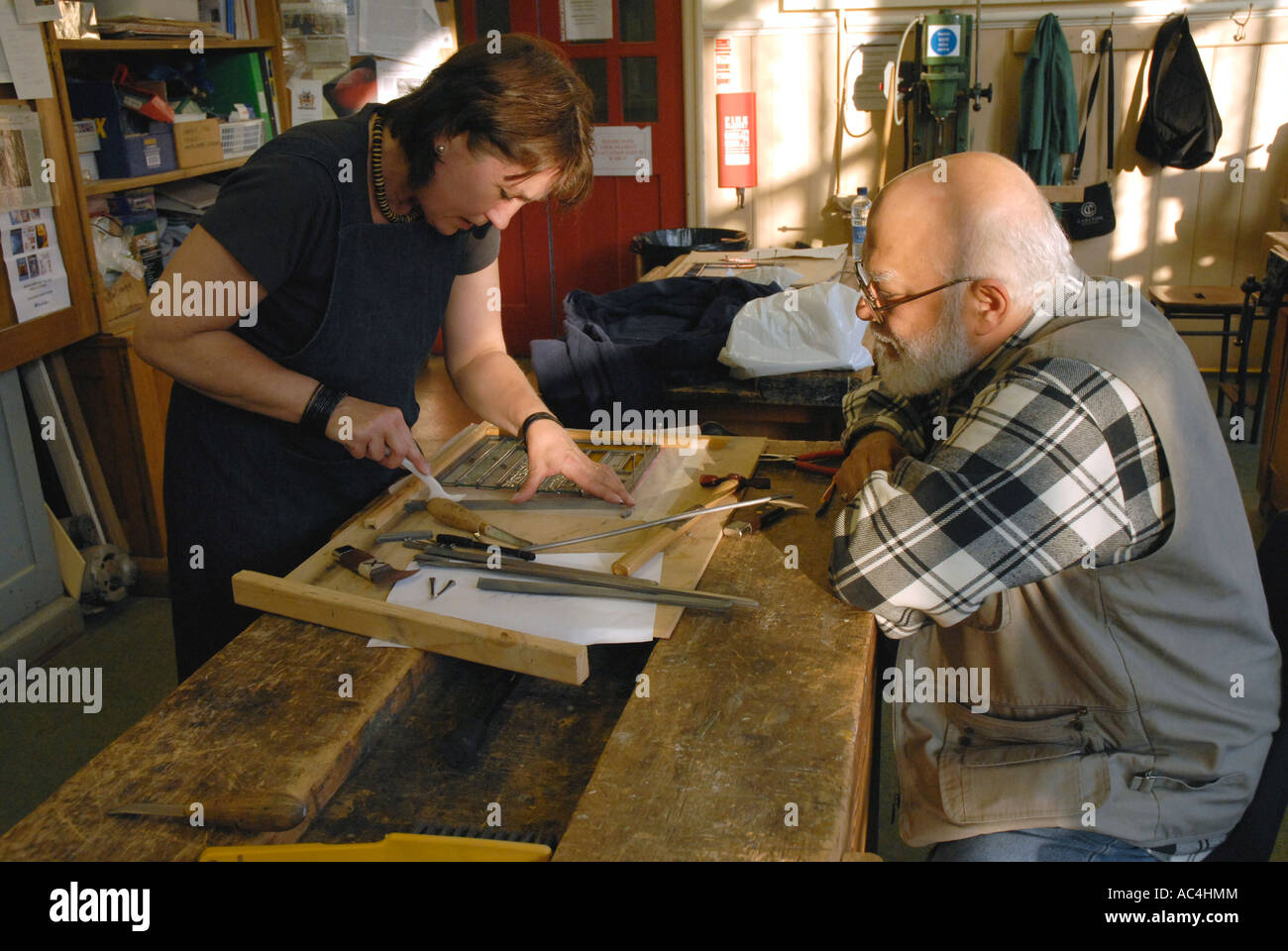 Teacher teaching adult education class in stain glass Stock Photo Alamy
