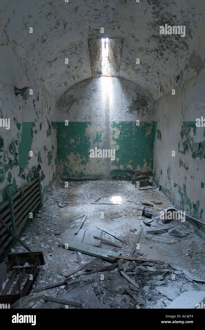 Decaying cell at the Eastern State Penitentiary, now a museum in Philadelphia, Pennsylvania. Stock Photo