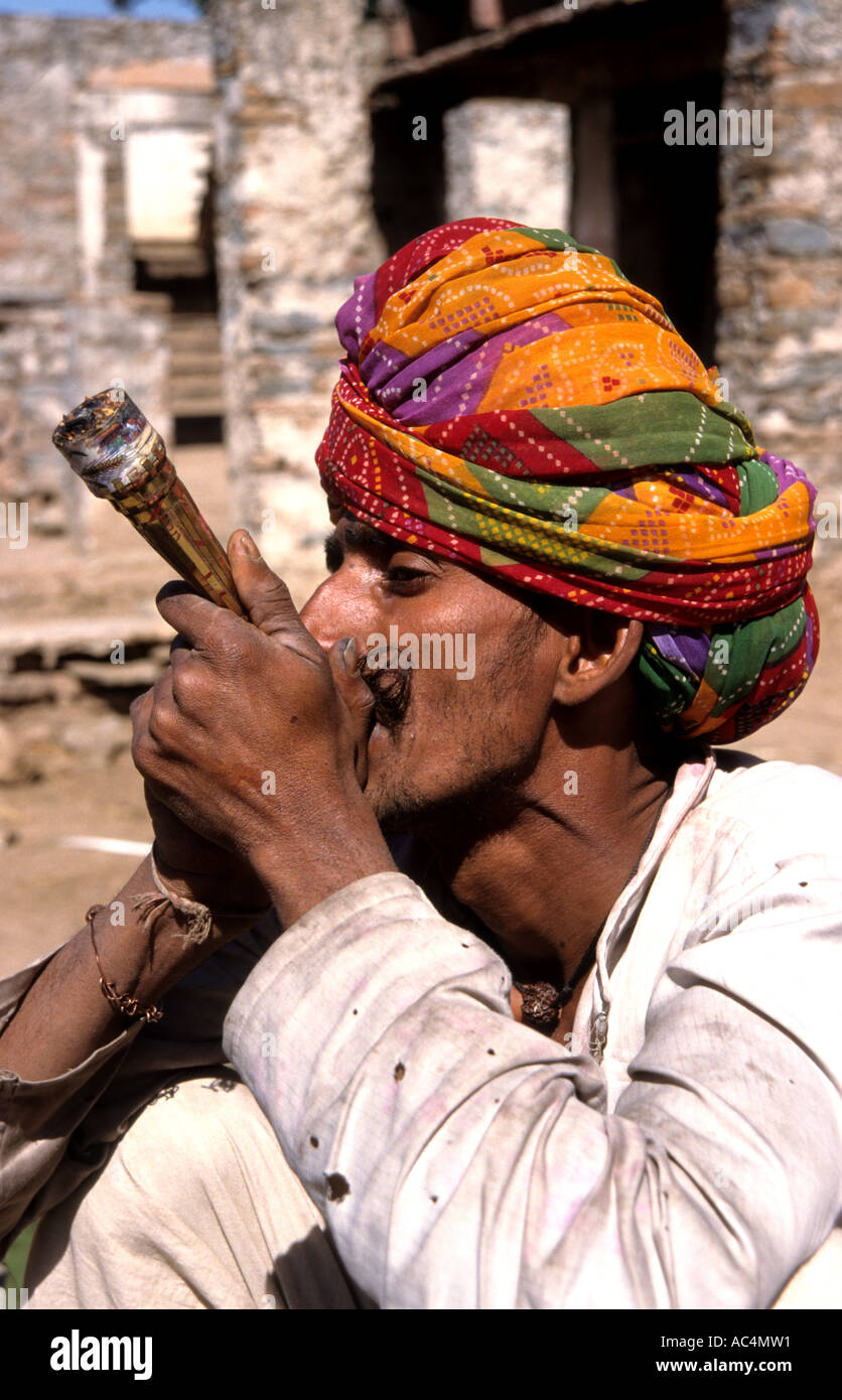 India Rajasthan hash hashish smoking Pipe Man drug Stock Photo