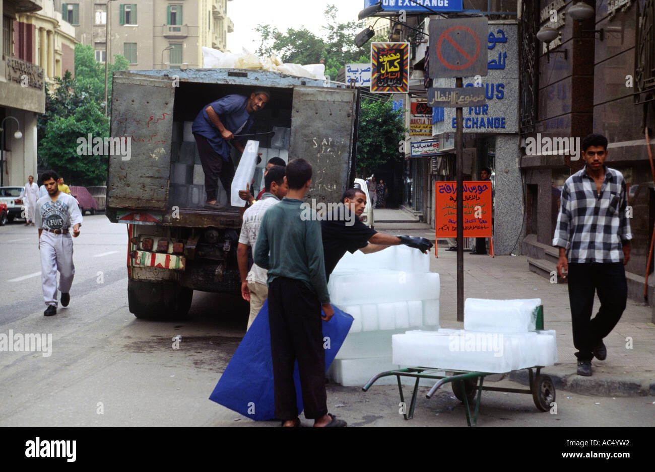 Unloading ice on street Cairo Egypt Stock Photo Alamy