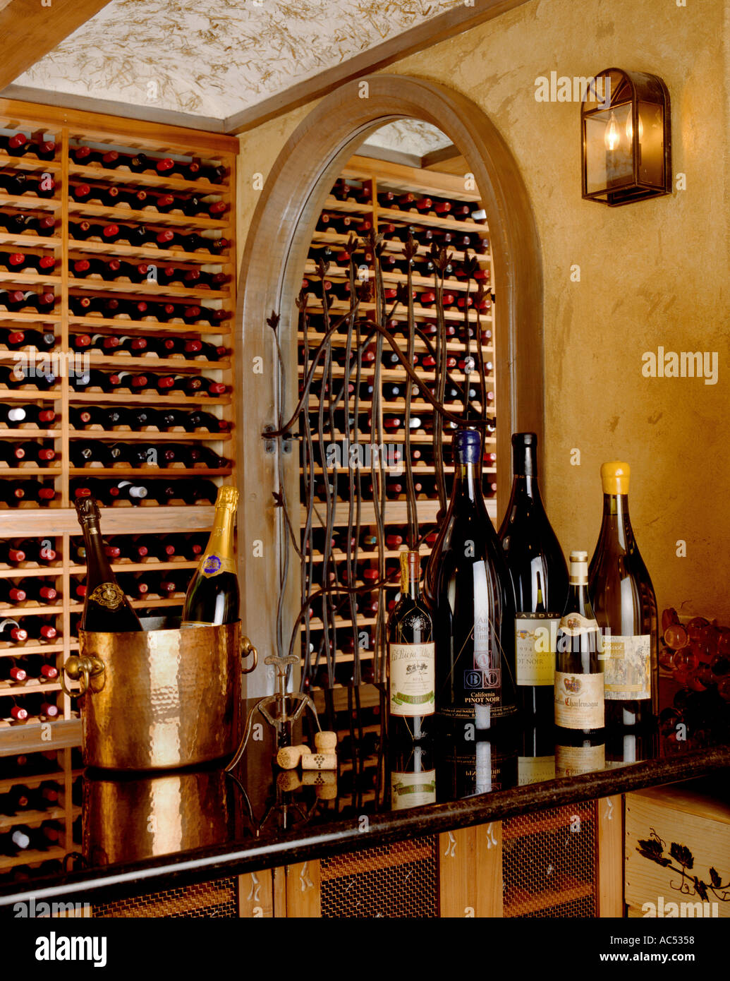 A beautiful private WINE CELLAR is stocked with a wide selection of