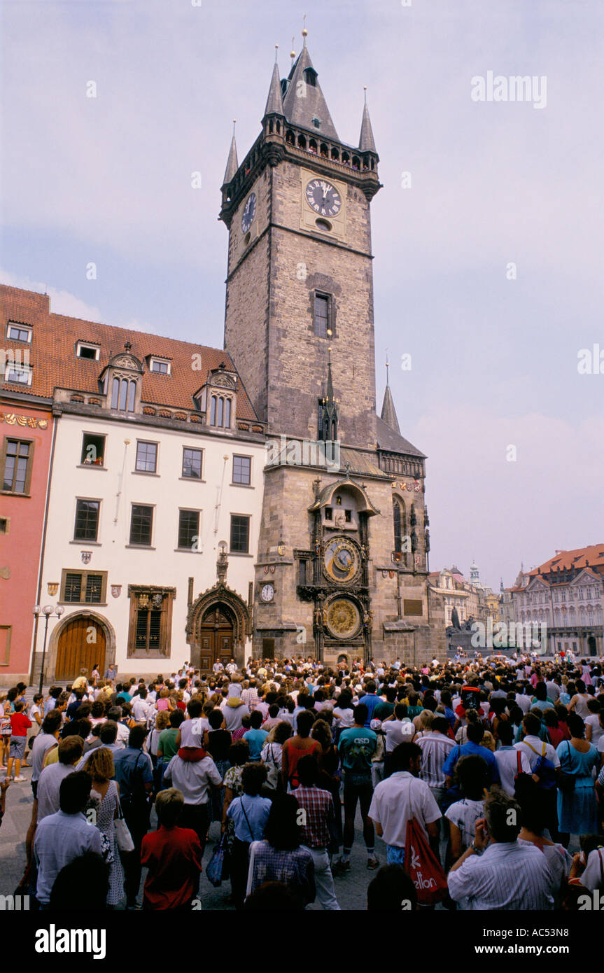 CROWD OF TOURISTS WAITING FOR FAMOUS CLOCK AT OLD CITY HALL TO CHIME PRAGUE  Stock Photo