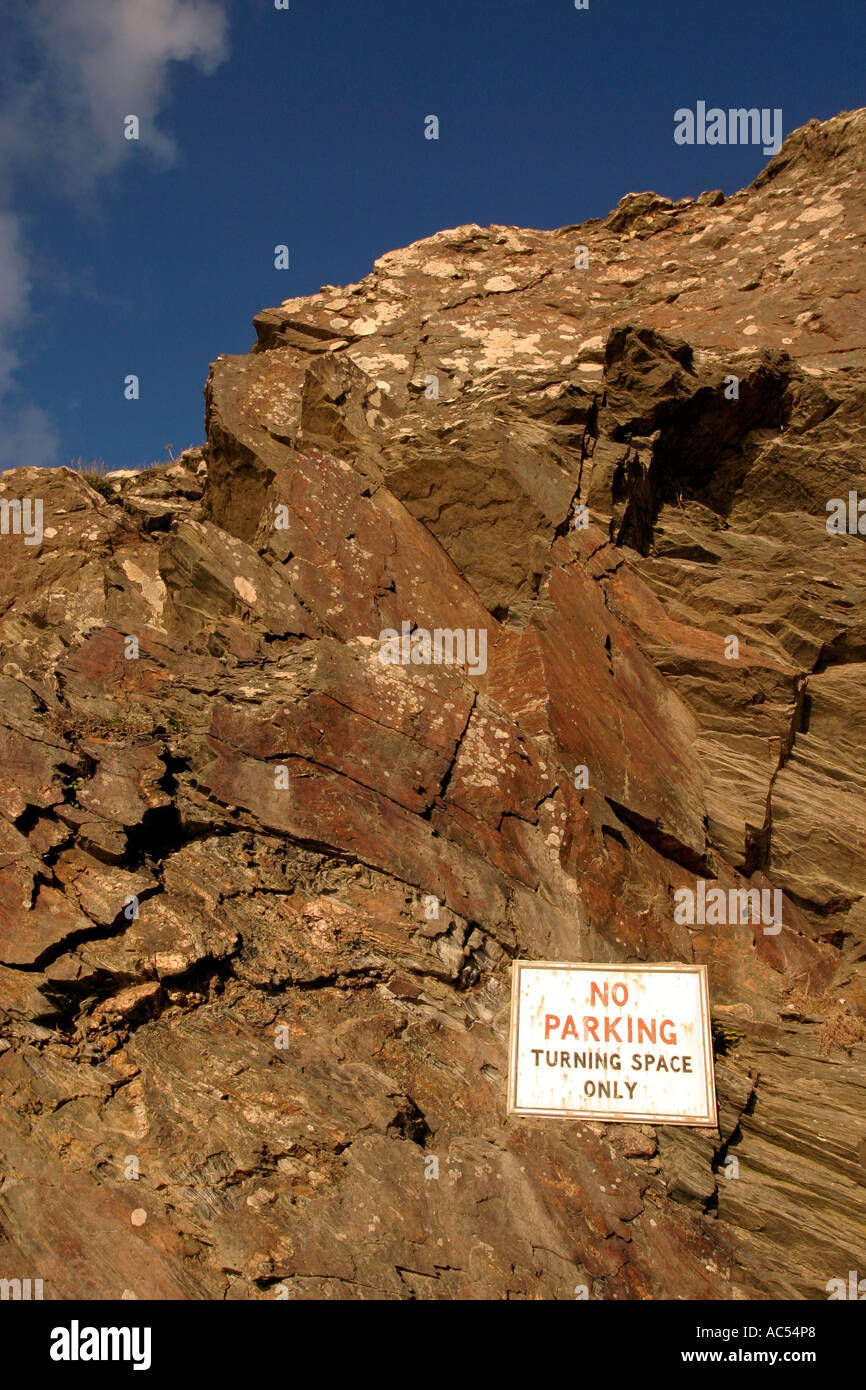 No parking sign on rocky cliff face Stock Photo