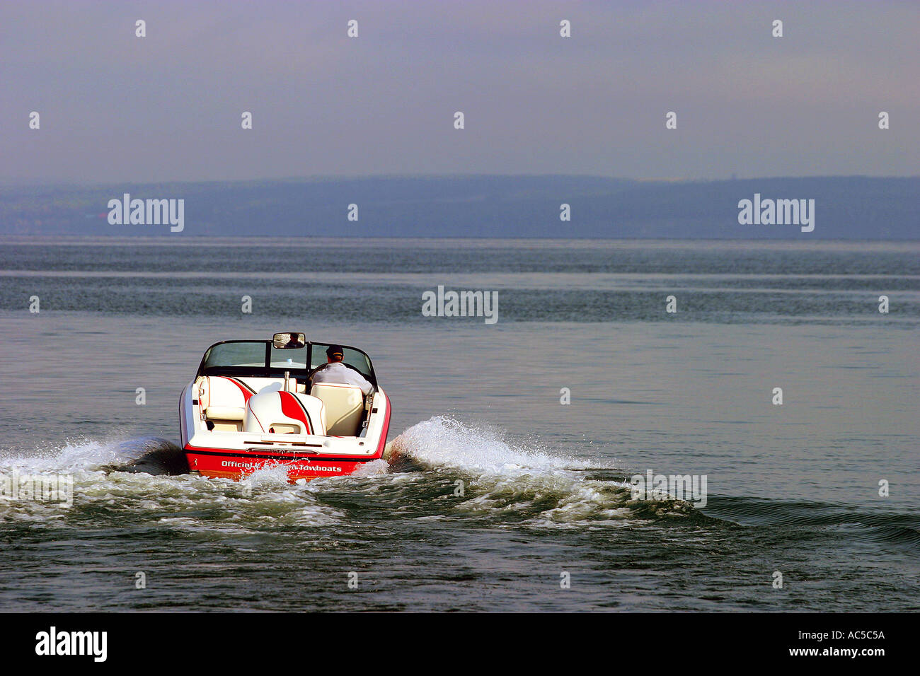 Powerboat on Sylvan Lake Canada Stock Photo