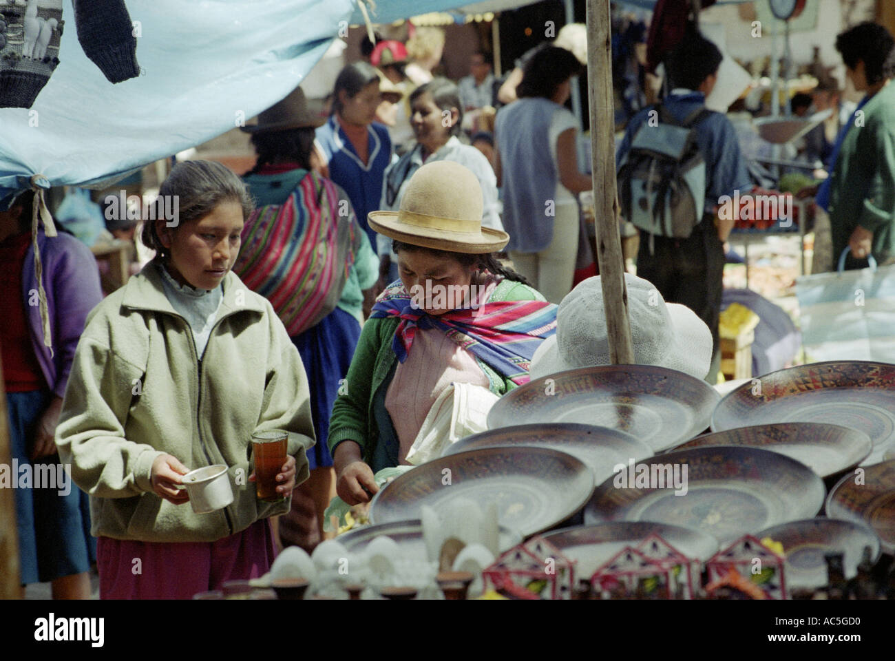 October 2002 Two local women at Pisac market near Cusco Peru James Sturcke Stock Photo