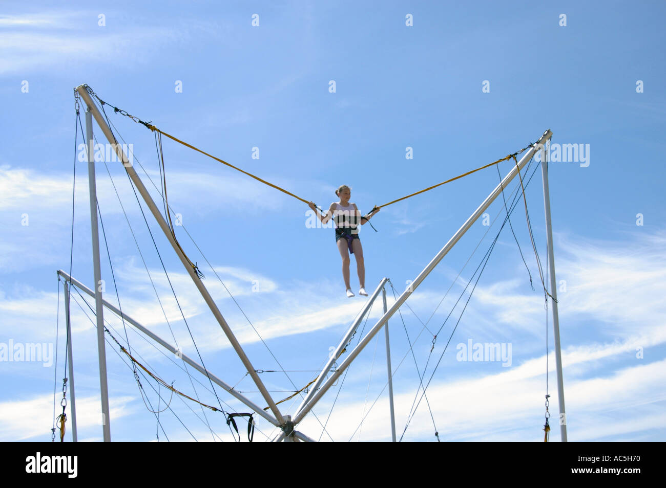 bungee acrobatics on Brighton beach Stock Photo Alamy