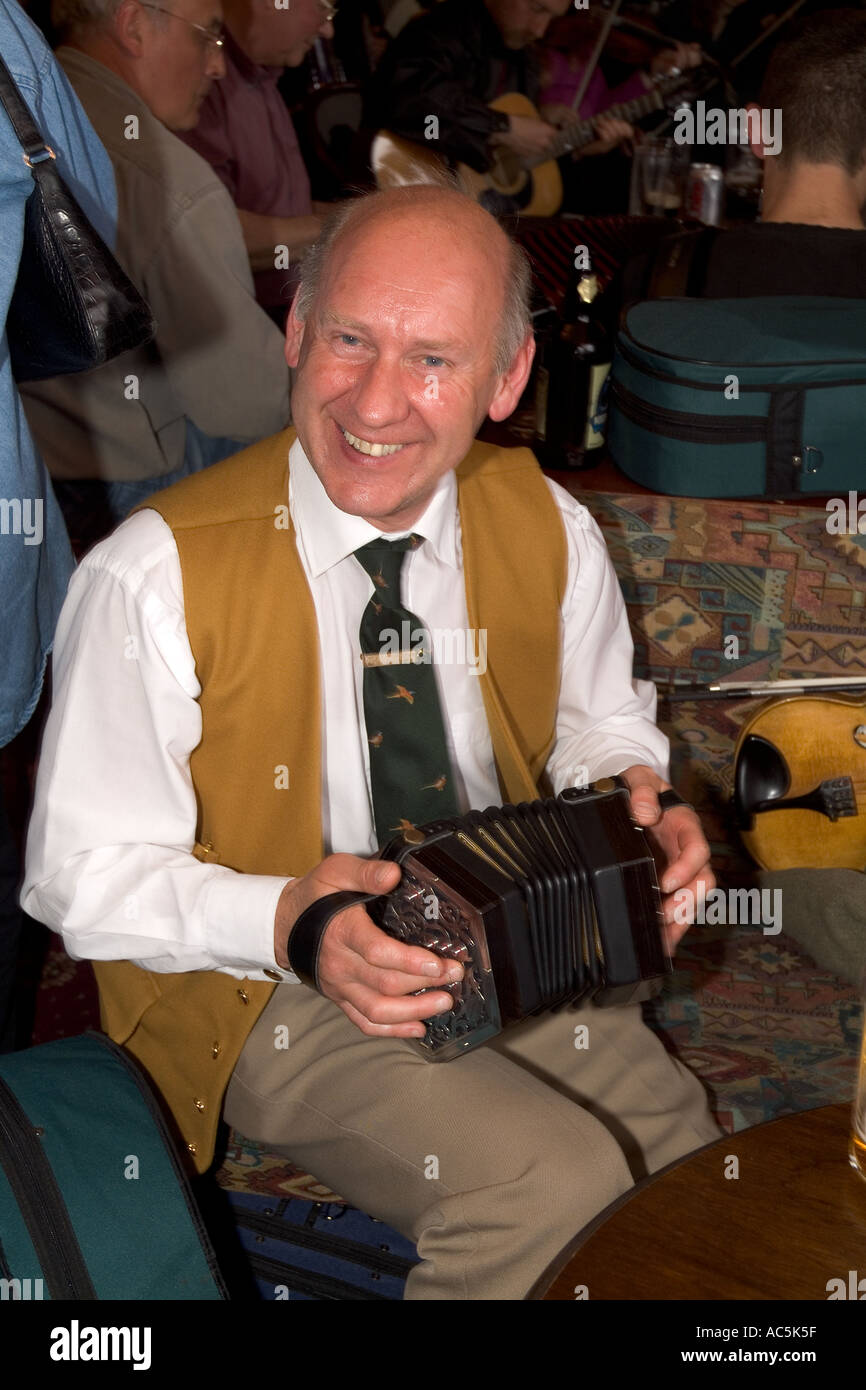 dh Orkney Folk Festival STROMNESS ORKNEY Musician playing Anglo Concertina Stromness Hotel lounge bar instrument Stock Photo
