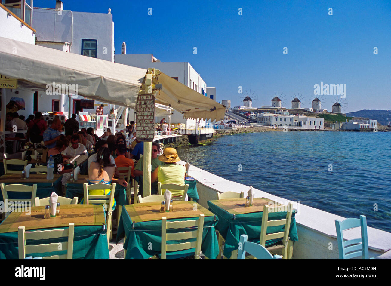 Restaurant, Little Venice, Mykonos Town, Hora, Chora, Greek Cyclades Island, Aegean Sea, Greece, E.U. European Union, Europe. Stock Photo