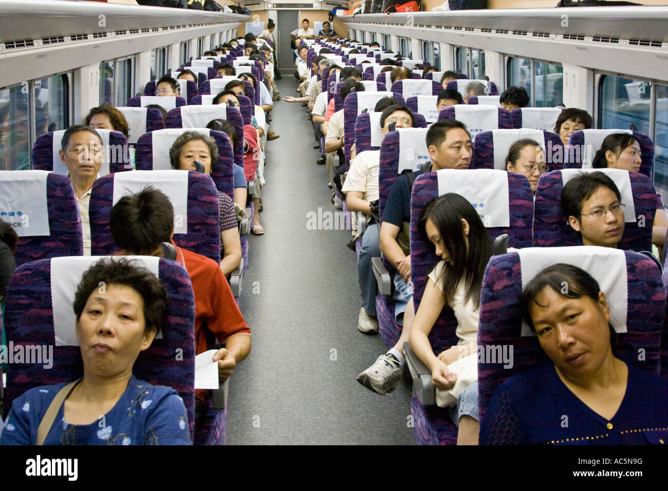 Chinese Passengers Inside High Speed Shanghai Nanjing Bullet Train