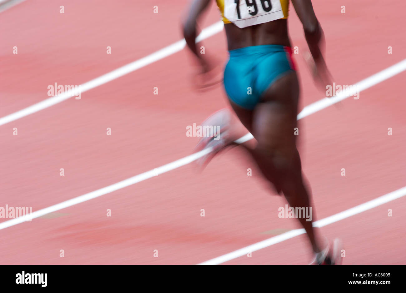 female competitor in a relay race Stock Photo Alamy