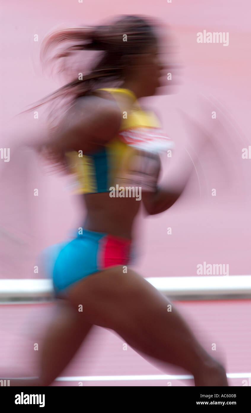 female competitor in a relay race Stock Photo Alamy