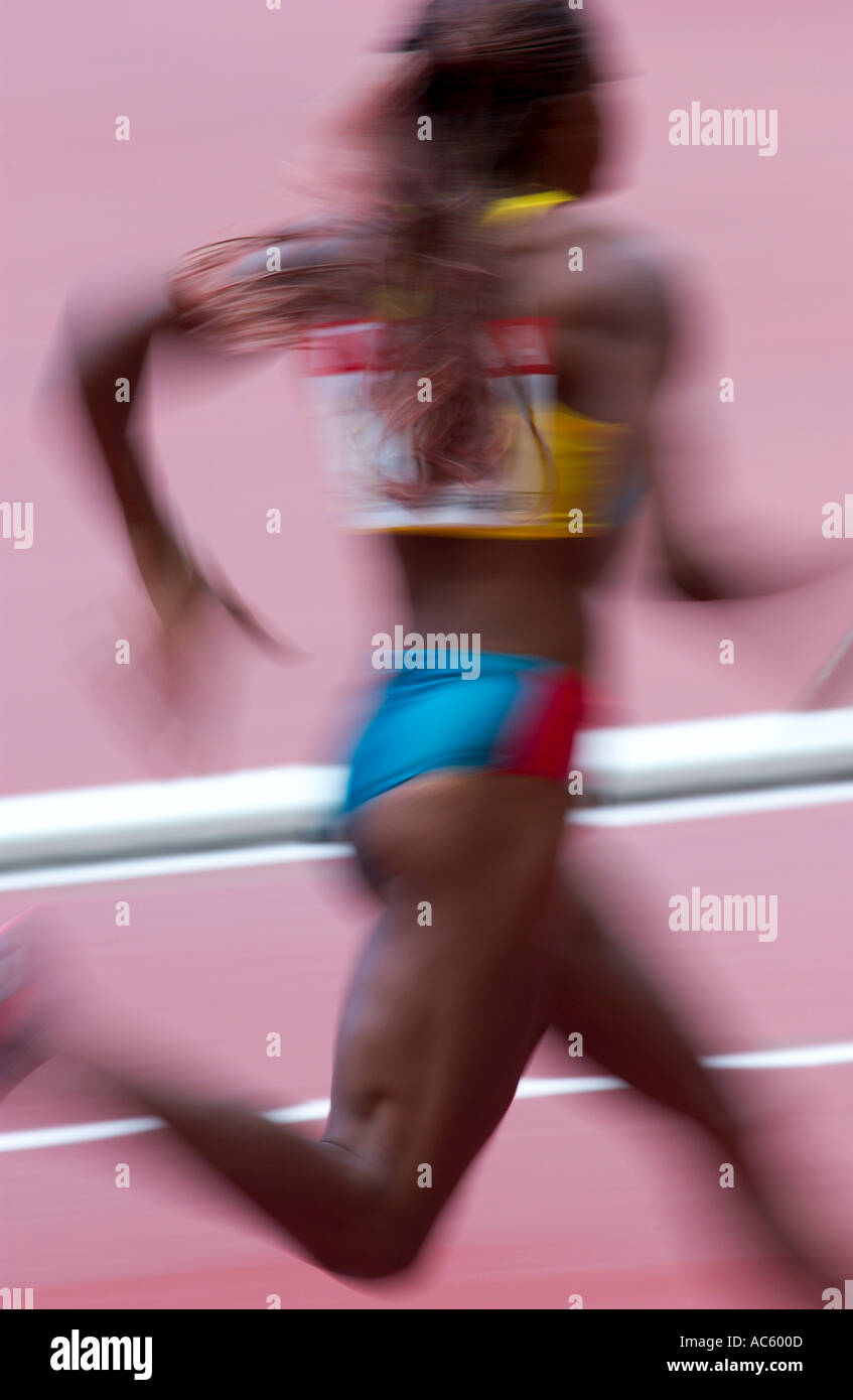 female competitor in a relay race Stock Photo Alamy
