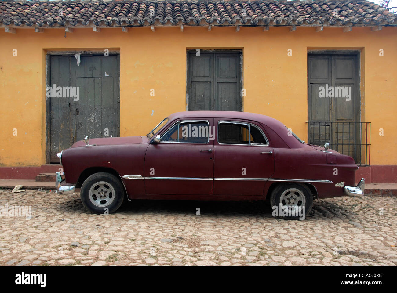 Maroon car in Cuba Stock Photo
