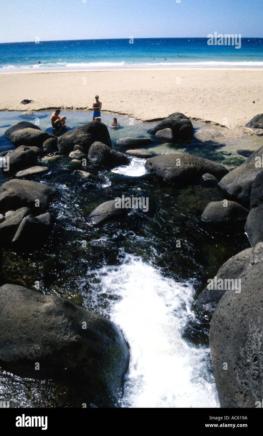 Hanakapiai stream flowing onto Hanakapiai Beach Kalalau Trail Kokee State Park Na Pali coast