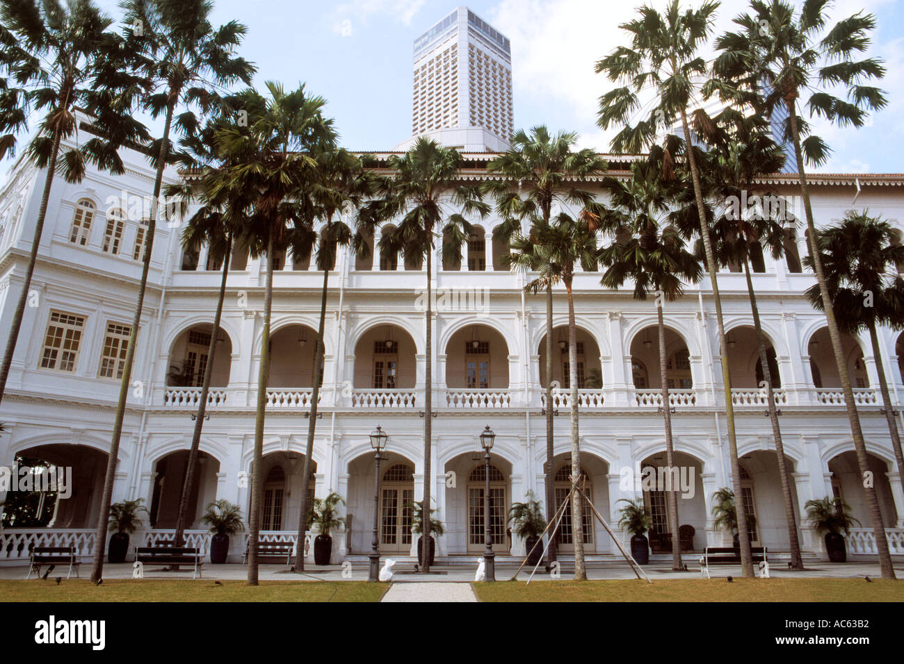 View of Palm Court in Raffles Hotel Singapore with Raffles City tower ...