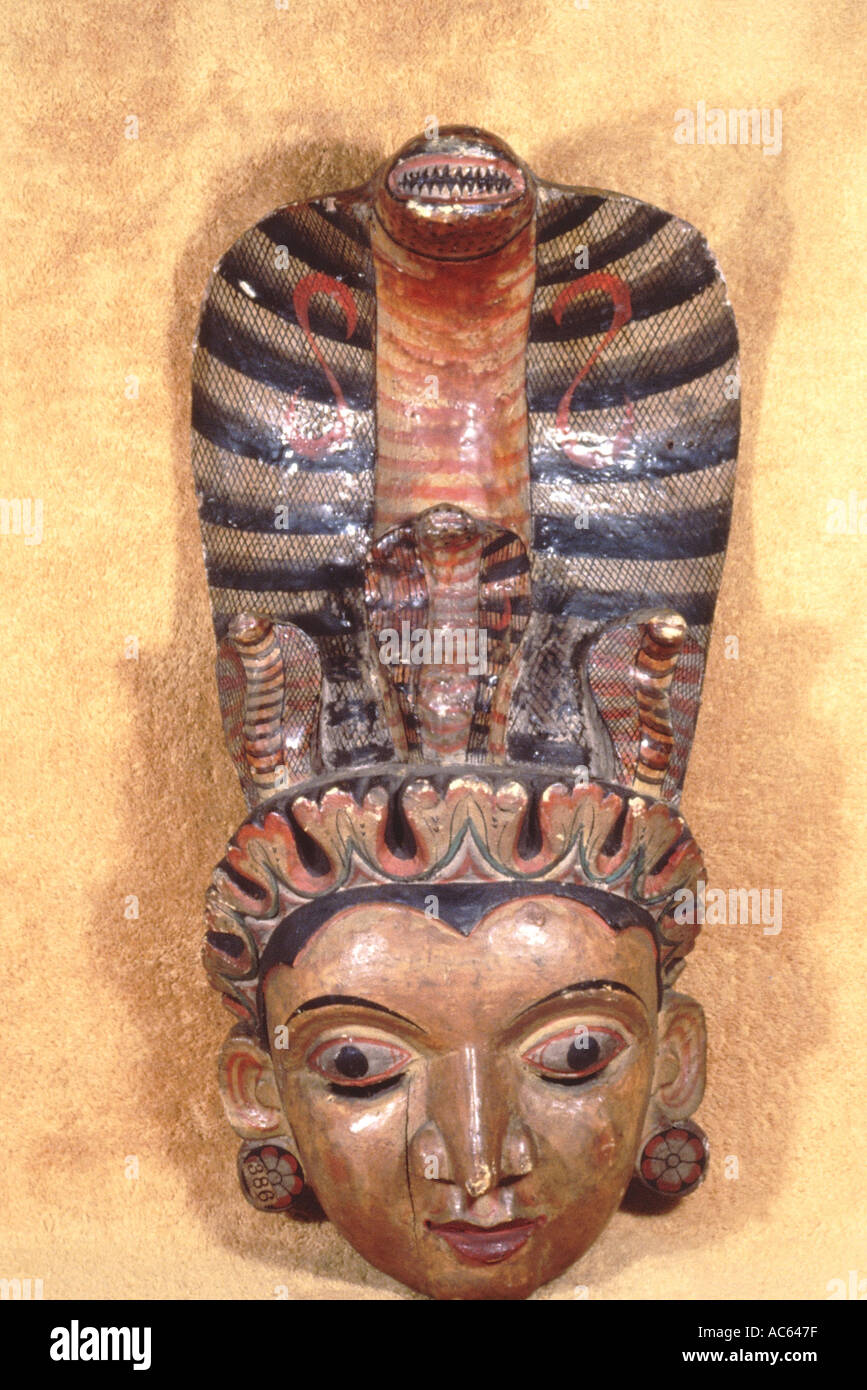 Naga Kanya.  Kolam dancer’s mask headdress has a large cobra head with an extended hood Stock Photo