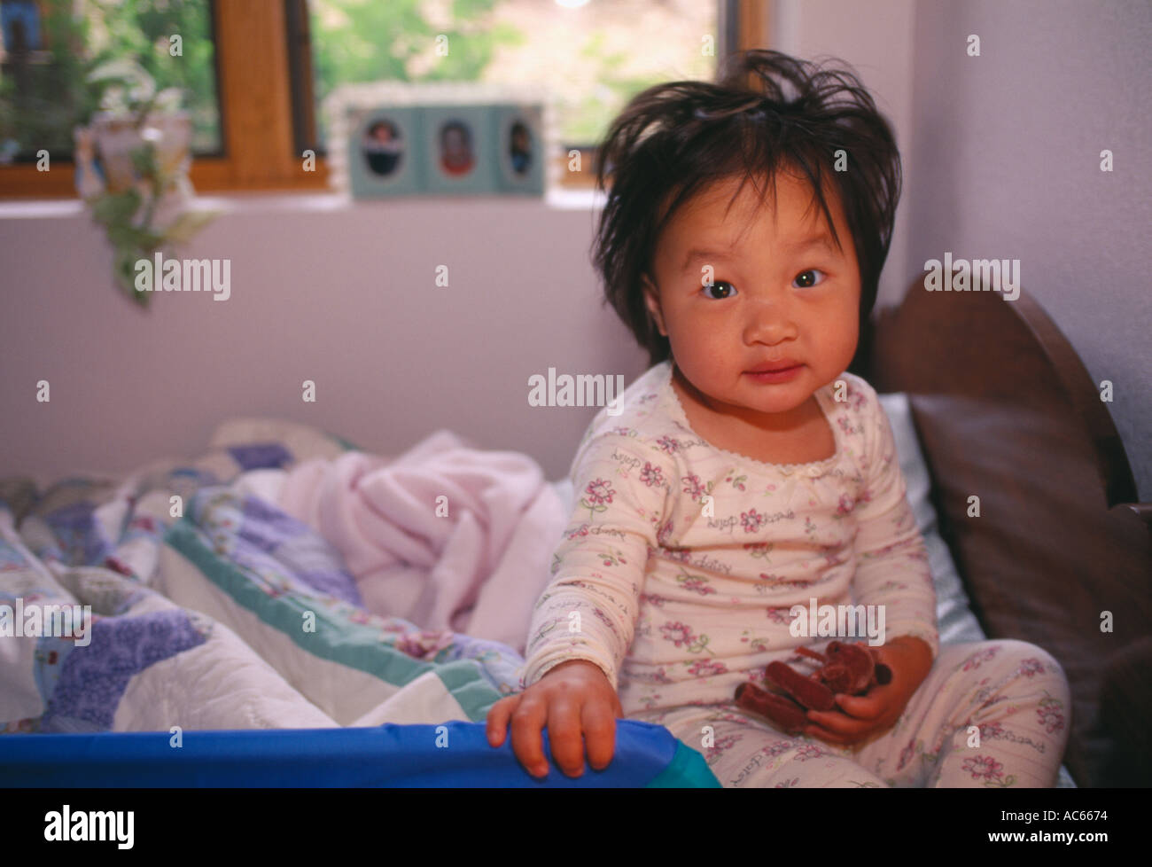 Young Asian girl who just awakened Estes Park CO Stock Photo - Alamy