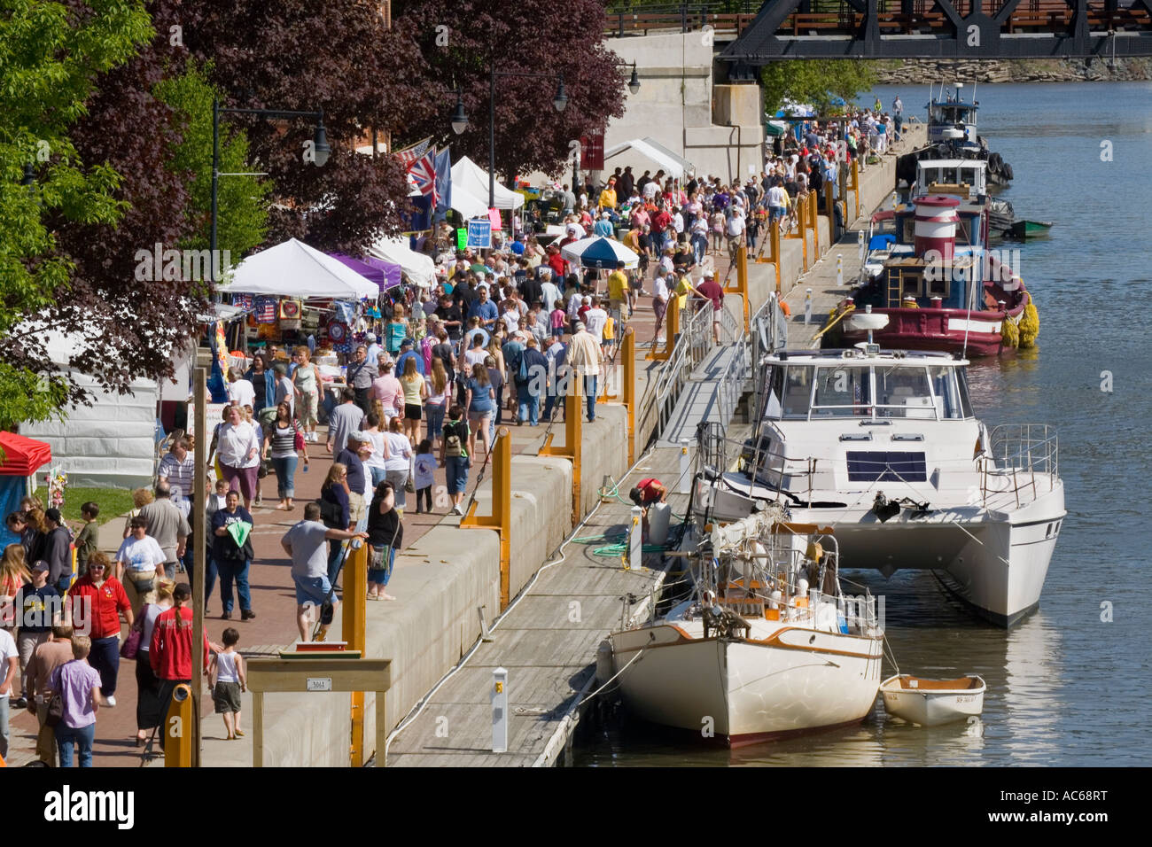 Crowds and boats at annual Canalfest Waterford New York flight of five