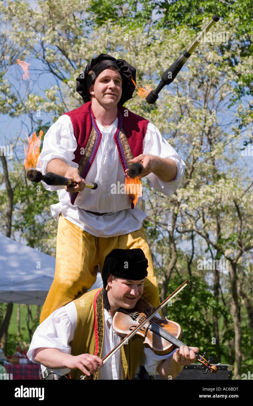 Two men juggle at a renaissance festival in Nebraska. Stock Photo