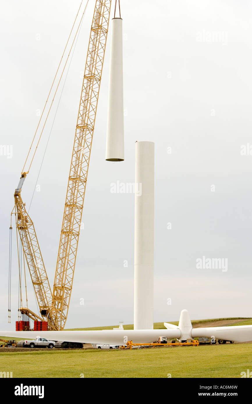 Crane preparing to attach last segment, wind turbine, wind farm, Oregon Stock Photo