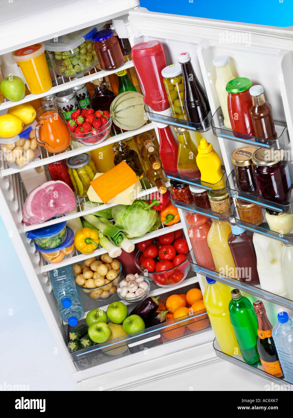 OPEN FULL FRIDGE Stock Photo