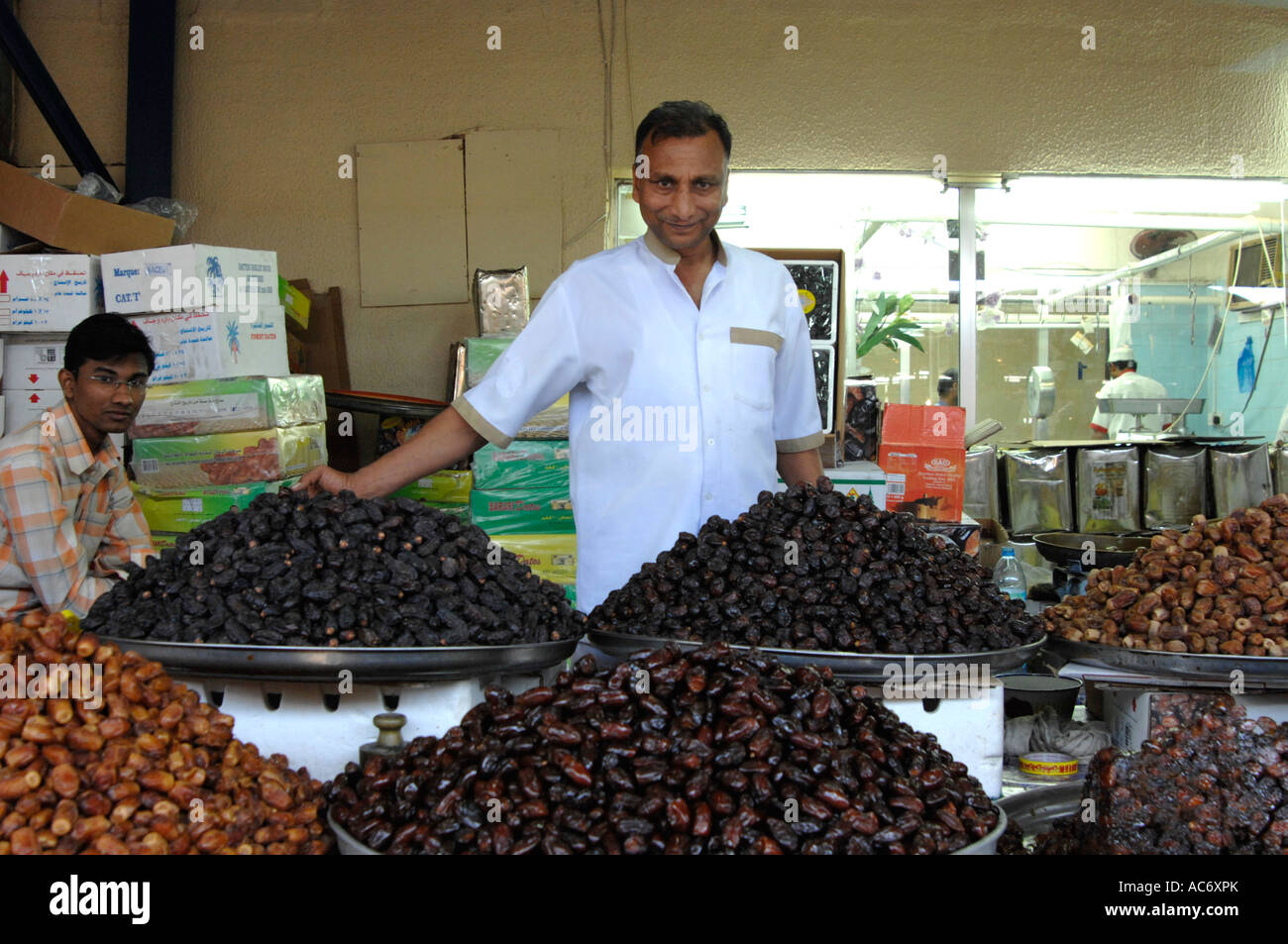 Date seller at market deira dubai Stock Photo Alamy