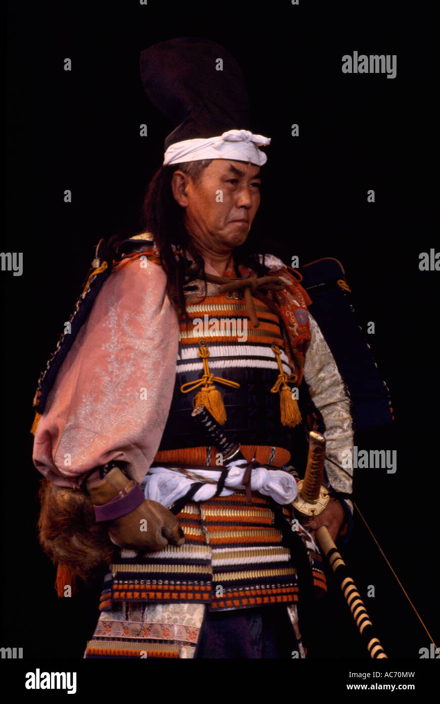 A Japanese Actor performing a Japanese Ritual with Bow and Arrow on ...