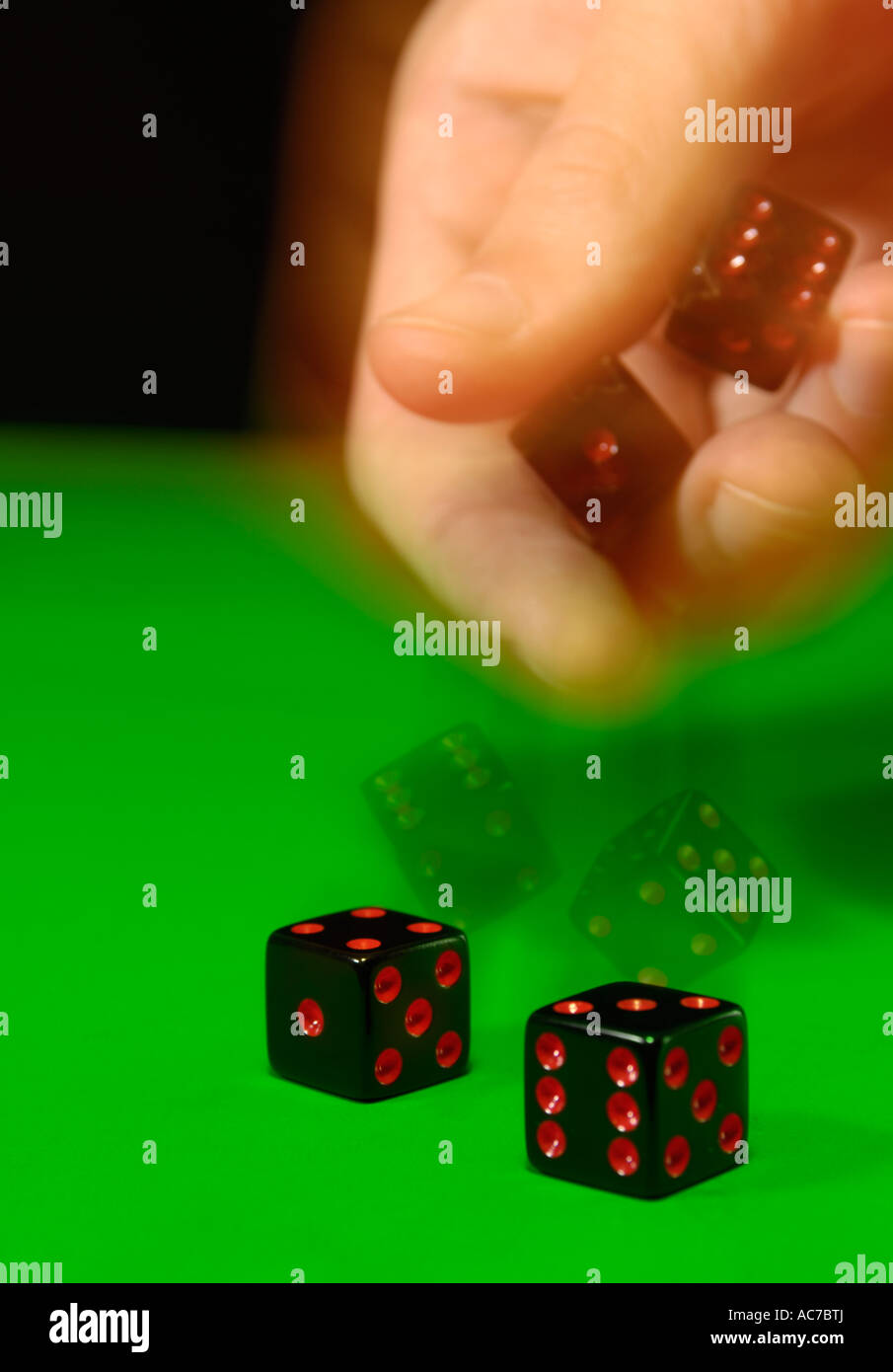 Dice rolling hi-res stock photography and images - Alamy