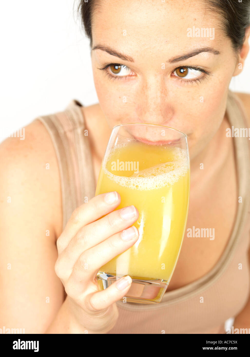 Young Woman Drinking Pineapple Juice 
