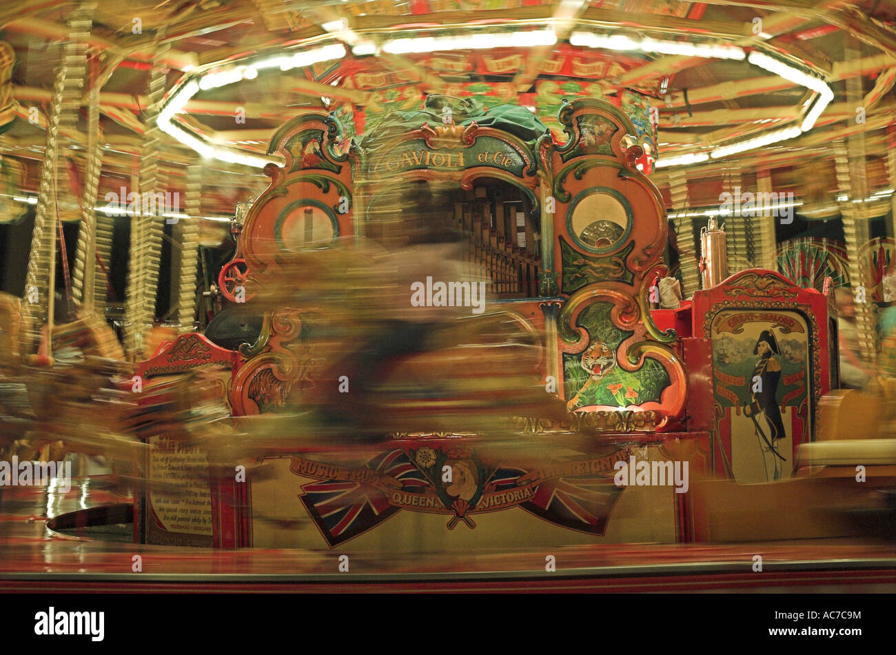 Carousel lit at night Stock Photo Alamy