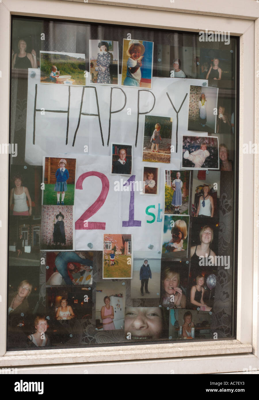 happy 21st birthday display in a window of a student bed sit in Aberystwyth Wales UK Stock Photo