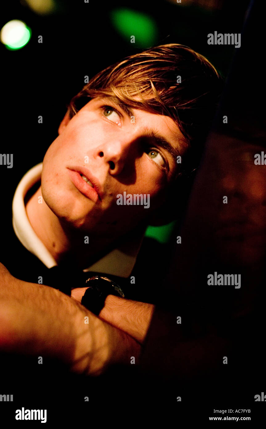 young male man with short blonde hair  looking moody and dreamy Stock Photo