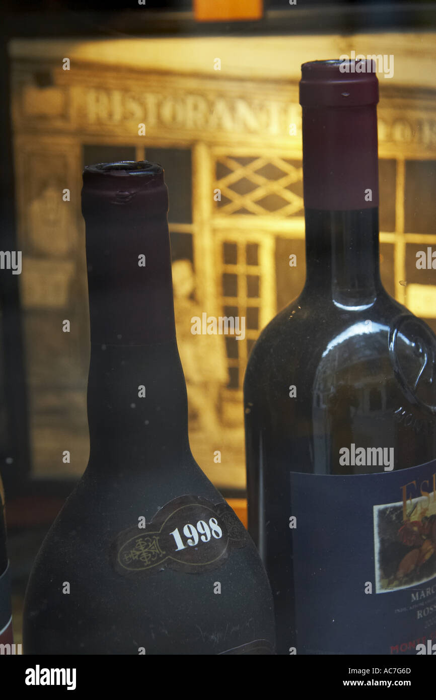 Wine bottles in wine shop window on Rue Galande in the Latin Quarter Paris France Stock Photo