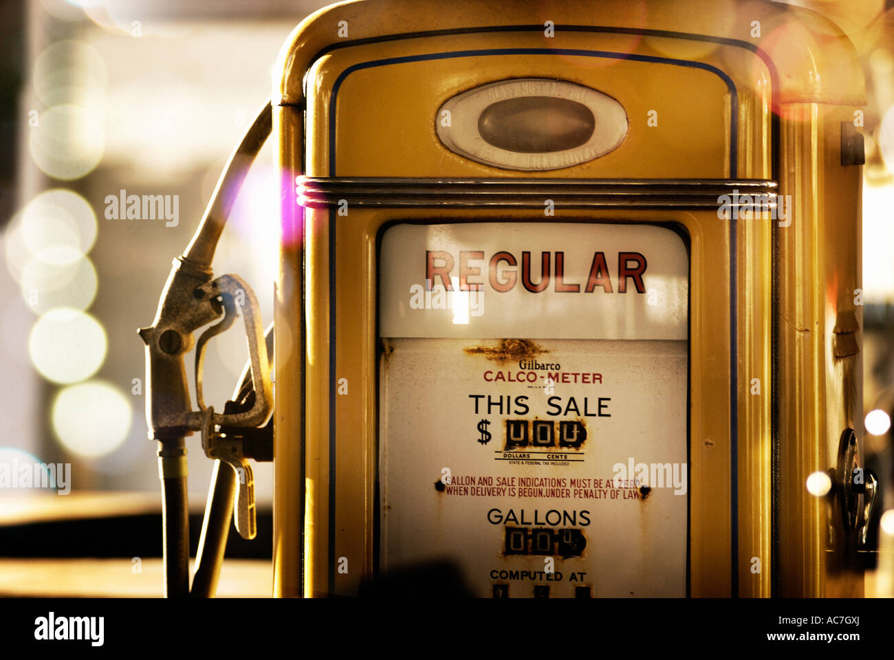 Old fashioned American yellow gas pump Stock Photo