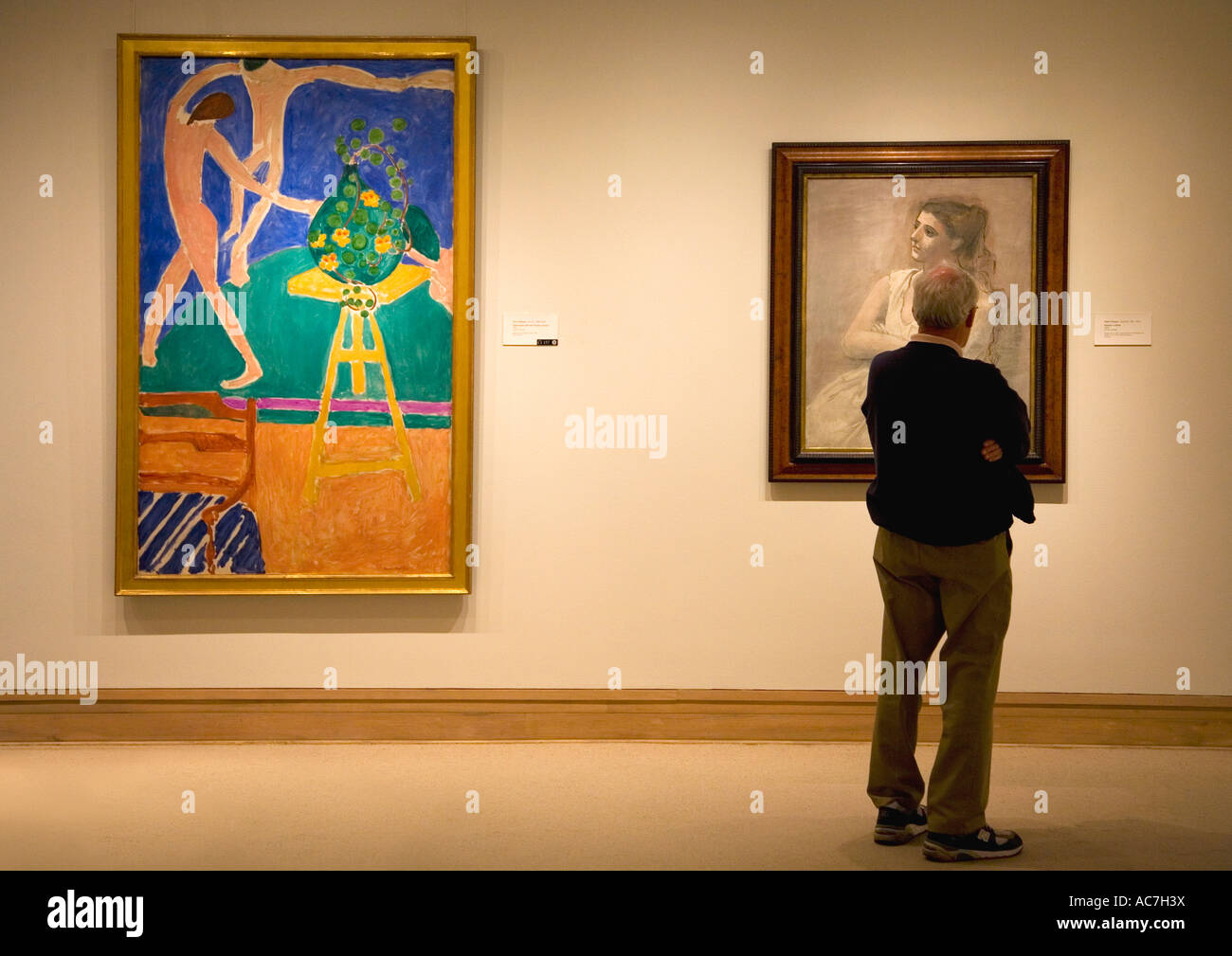 MOMA Museum of Art Gallery with man looking at paintings by Henri Matisse and Pablo Picasso New York City NY Stock Photo - Alamy