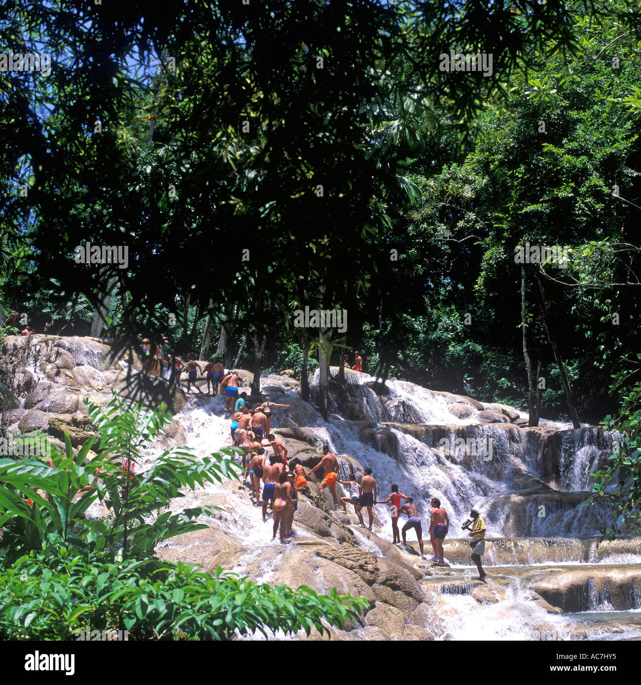 TOURISTS AT DUNNS RIVER FALLS JAMAICA Stock Photo