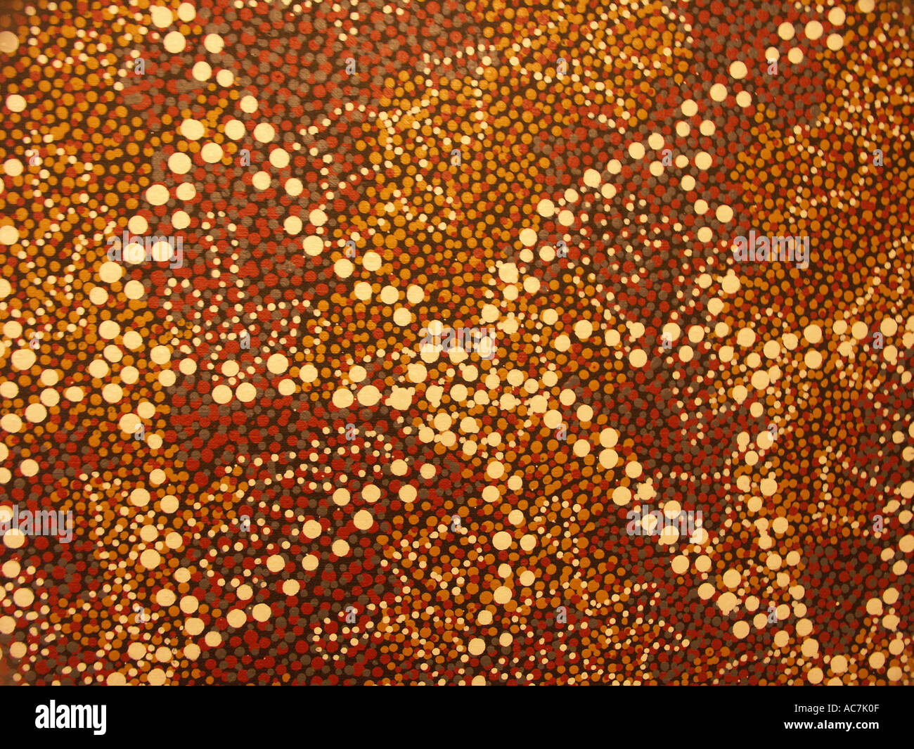 part of a beautiful aboriginal painting hanging on the kitchen wall of a london home in england Stock Photo