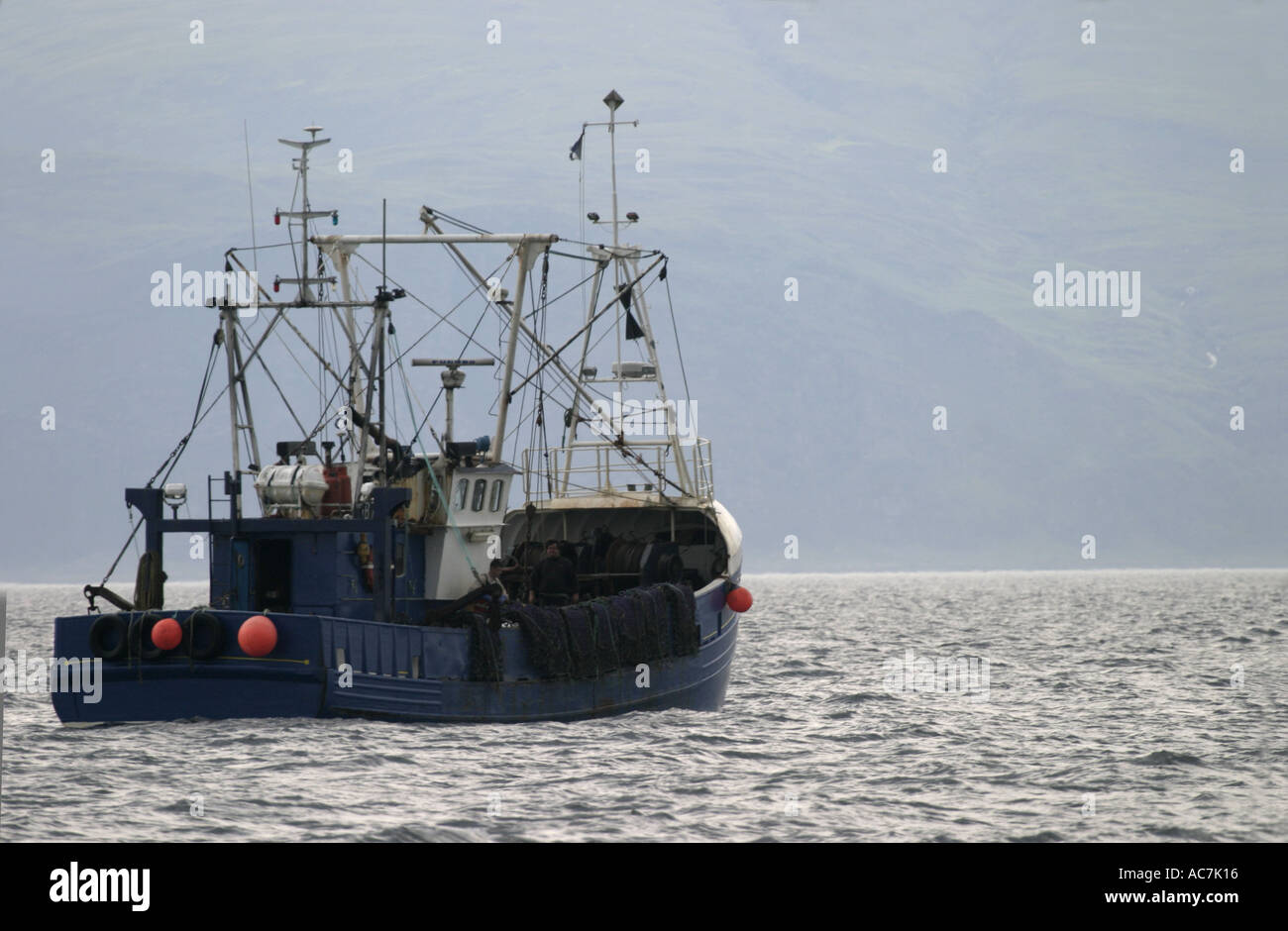 A scallop dredger operating in the Firth of Lorne off the West Coast of Scotland Stock Photo
