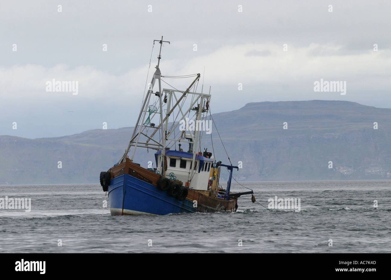 Scallop dredging boat operating in the Firth of Lorne SAC off Scotlands West coast Stock Photo