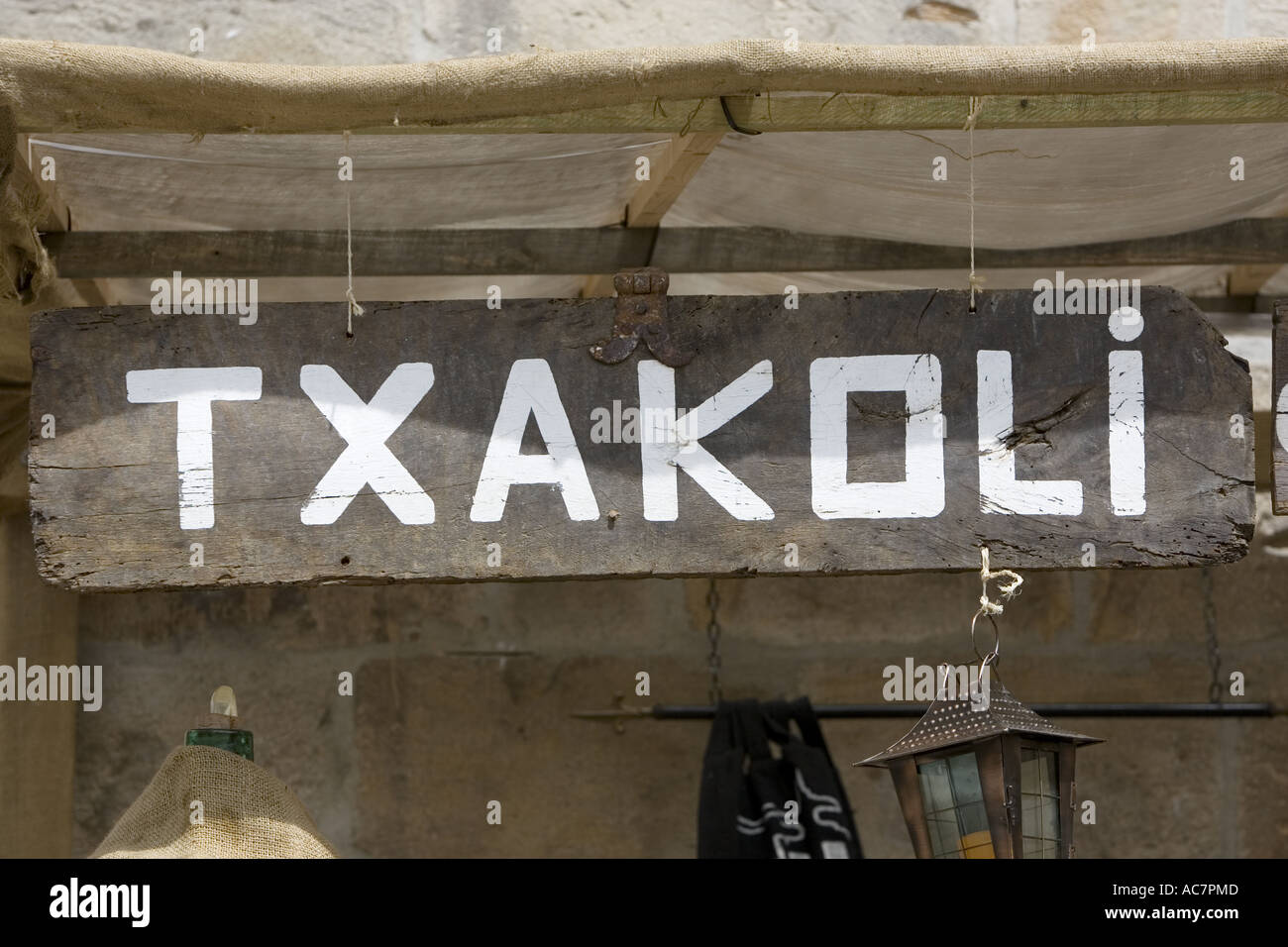 Txakoli sign above food stall at medieval market, Balmaseda, Basque Country Stock Photo