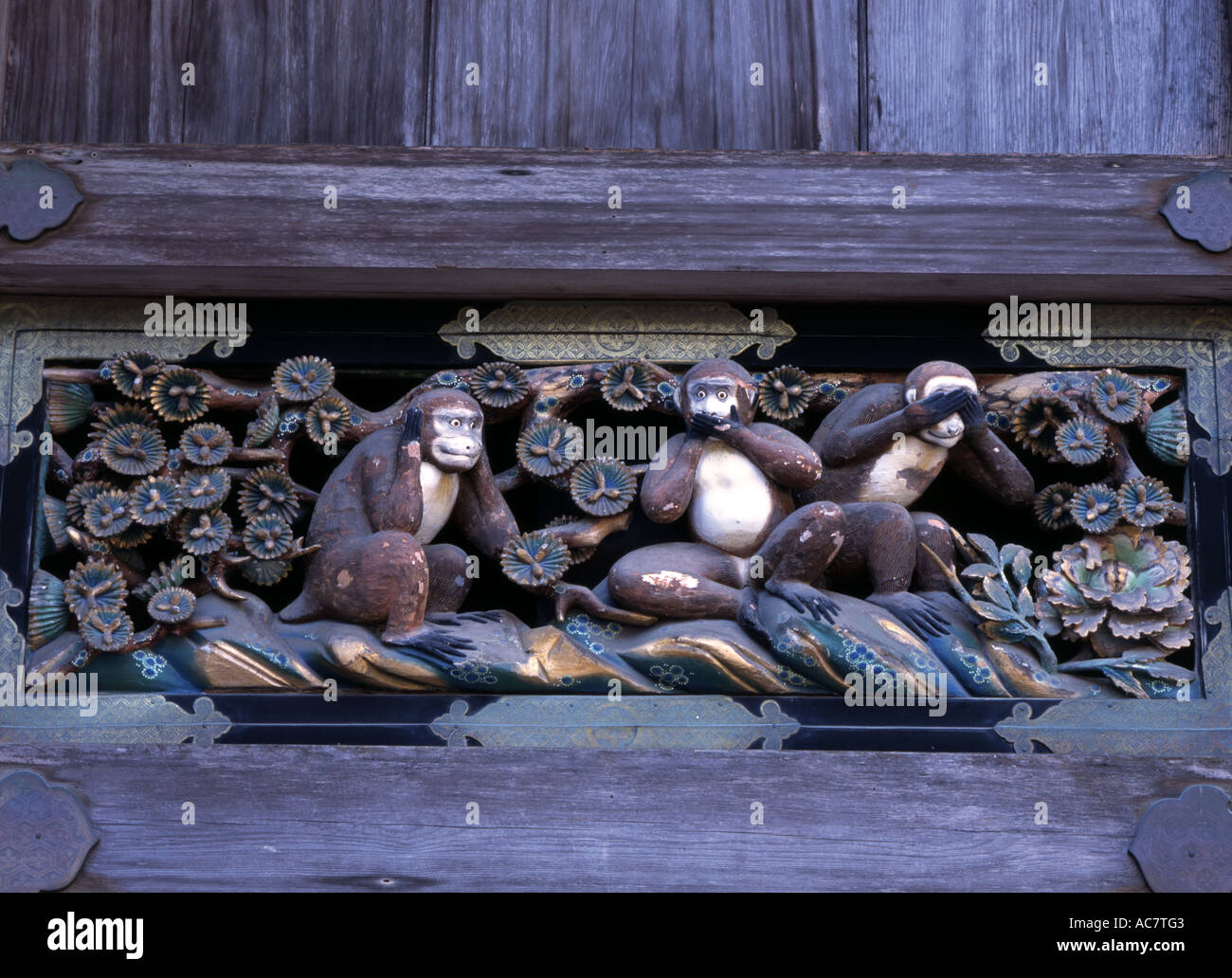 Three monkeys carving at Nikko Toshogu Shrine. Hear no evil, speak no evil, see no evil. Stock Photo
