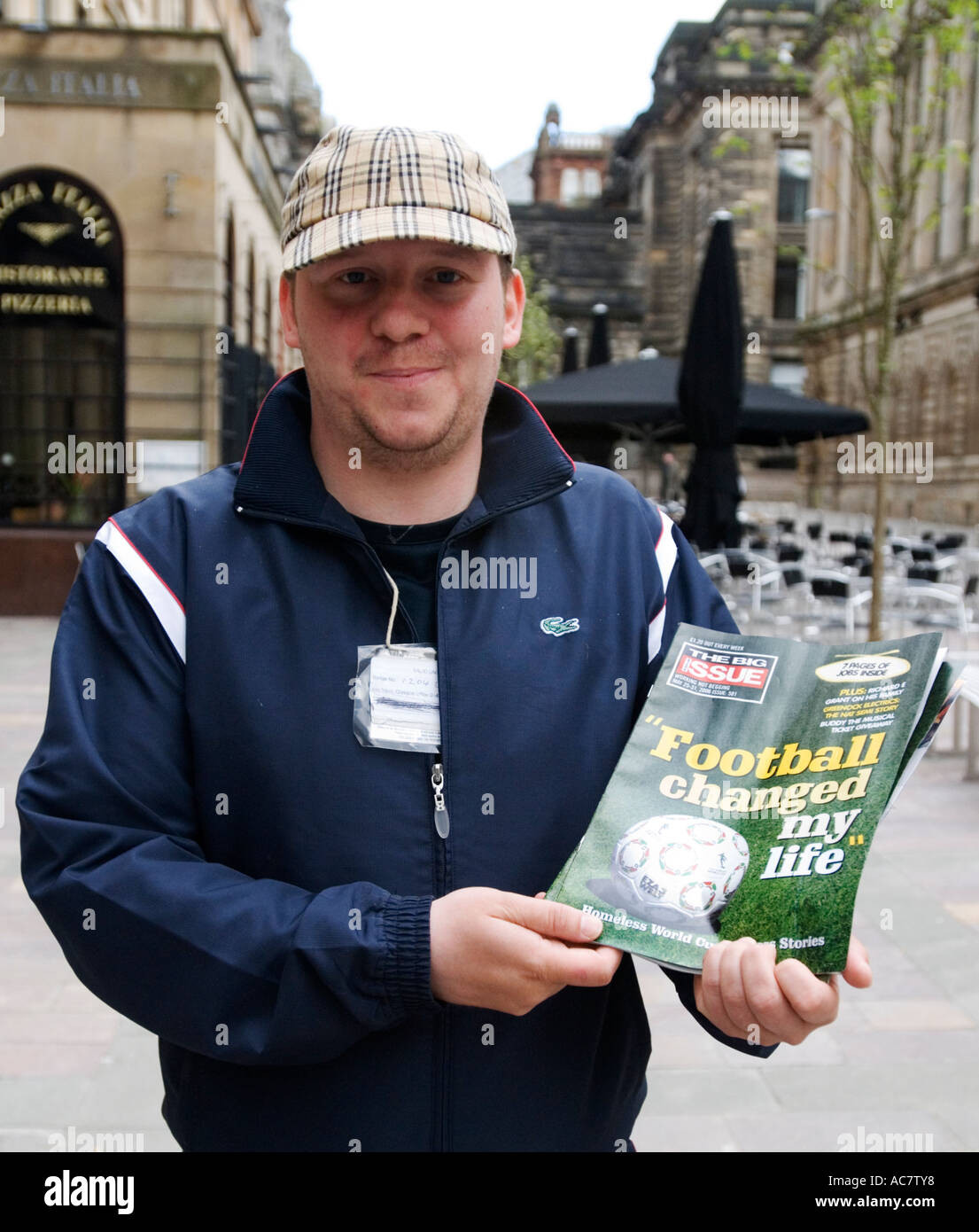 possibly Homeless man selling copy of The Big Issue in central Glasgow 2006 Stock Photo