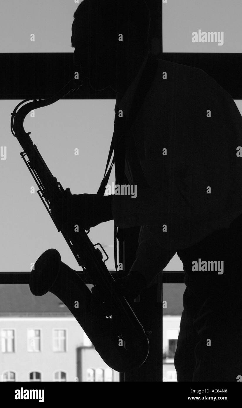 Silhouette of a saxophon player Stock Photo