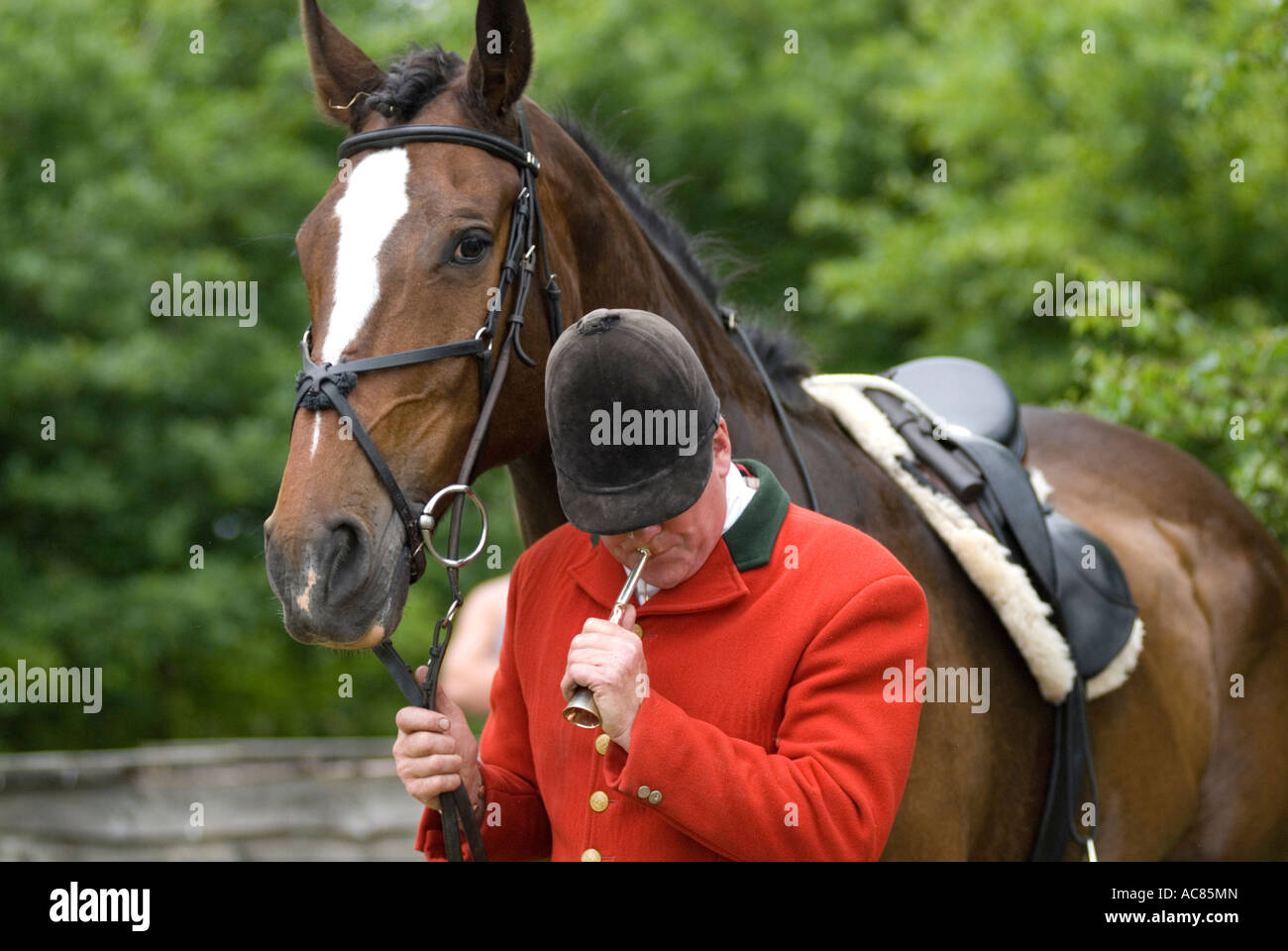 Huntsmen with his horse Stock Photo