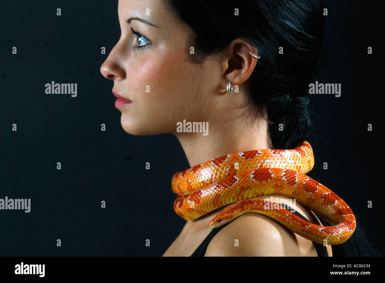 Girl with snake around her hires stock photography and images Alamy