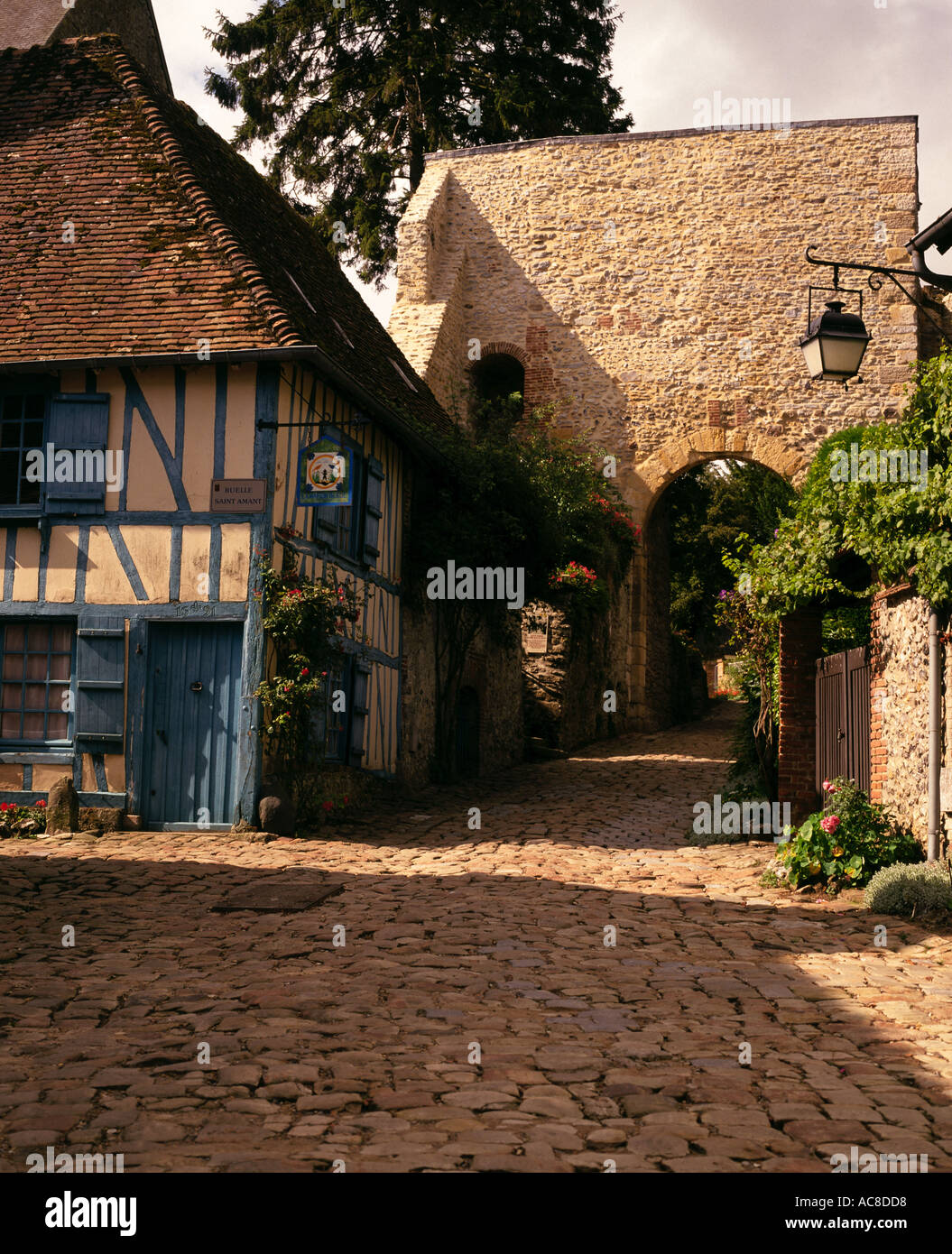 BLUE HOUSE AND COBBLED STREET GERBEROY FRANCE Stock Photo Alamy