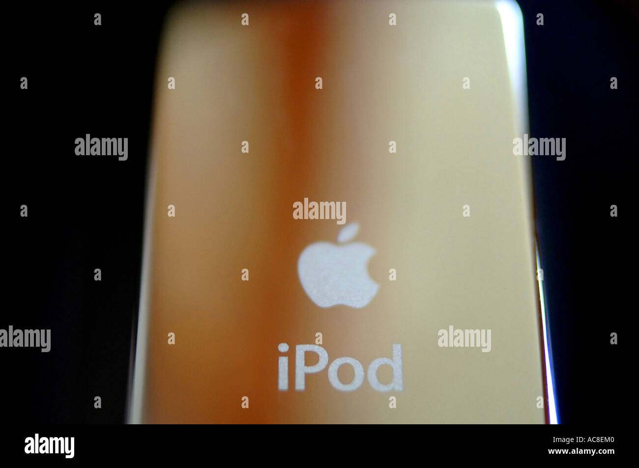 The back of an apple iPod nano showing the apple logo. Stock Photo