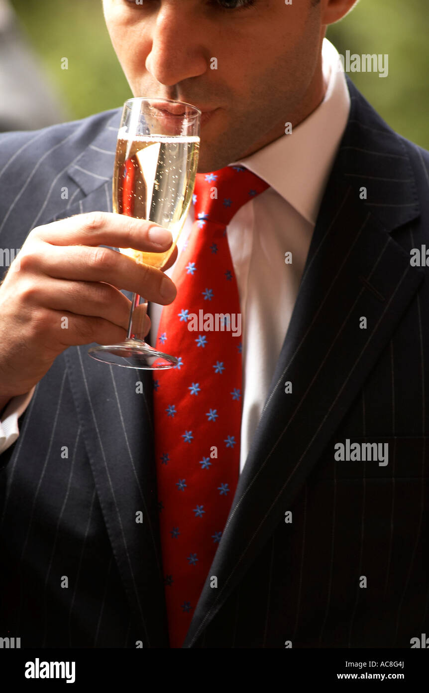 Man drinking champagne Stock Photo