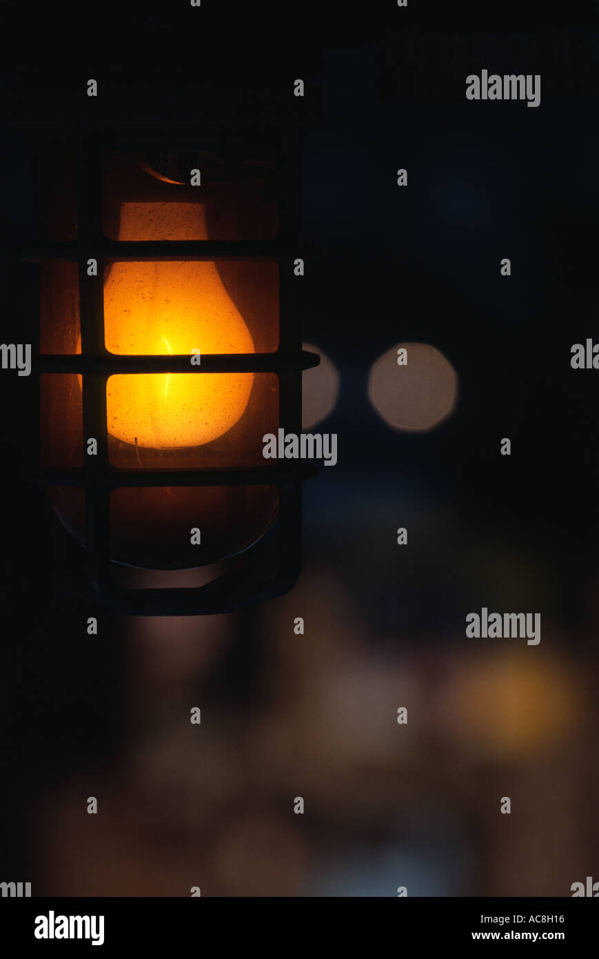 Incandescent safety bulb on traffic barrier New York City Stock Photo